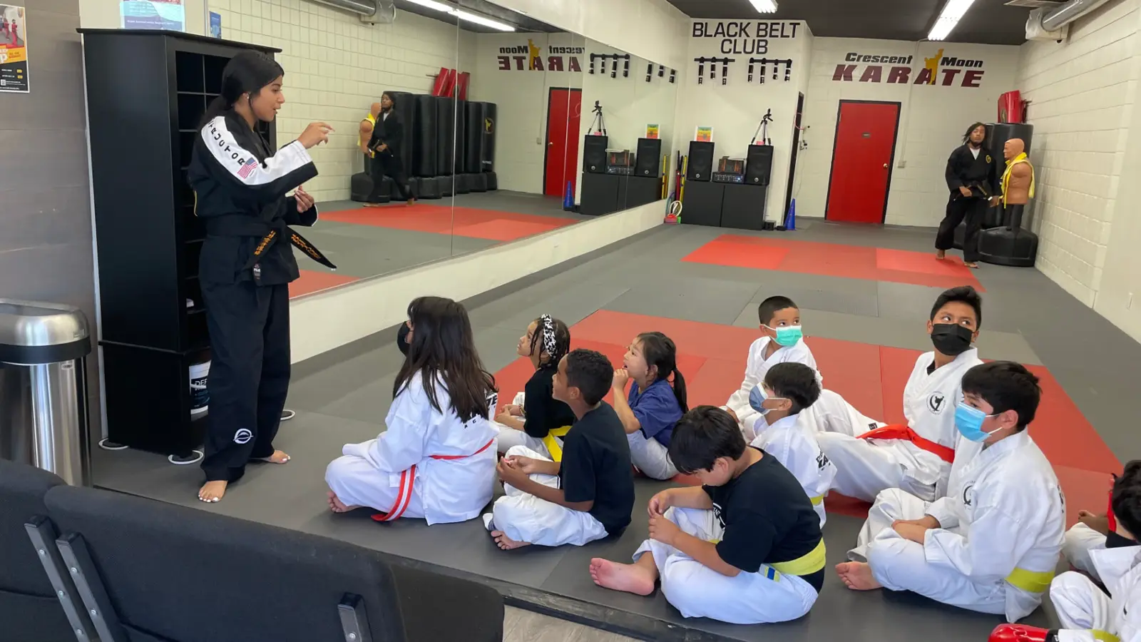 Students listen to their instructor